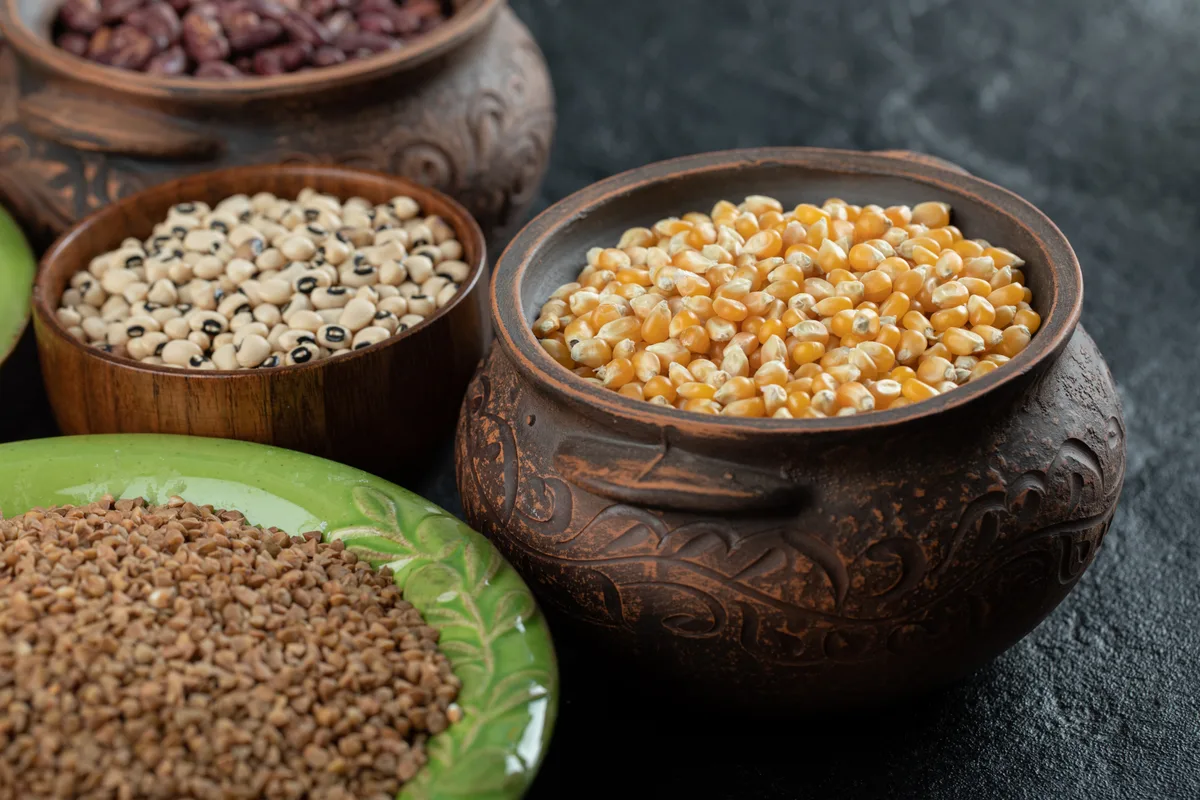 Different kinds of beans, lentils, and peas in bowls - ACHFN, African & Caribbean Heritage Food Network